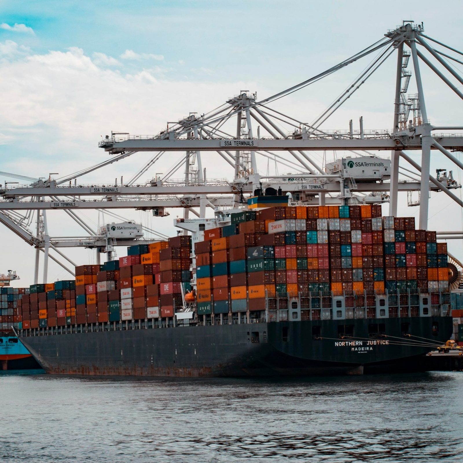 Vehicle carrier vessel representing RORO and container shipping choices