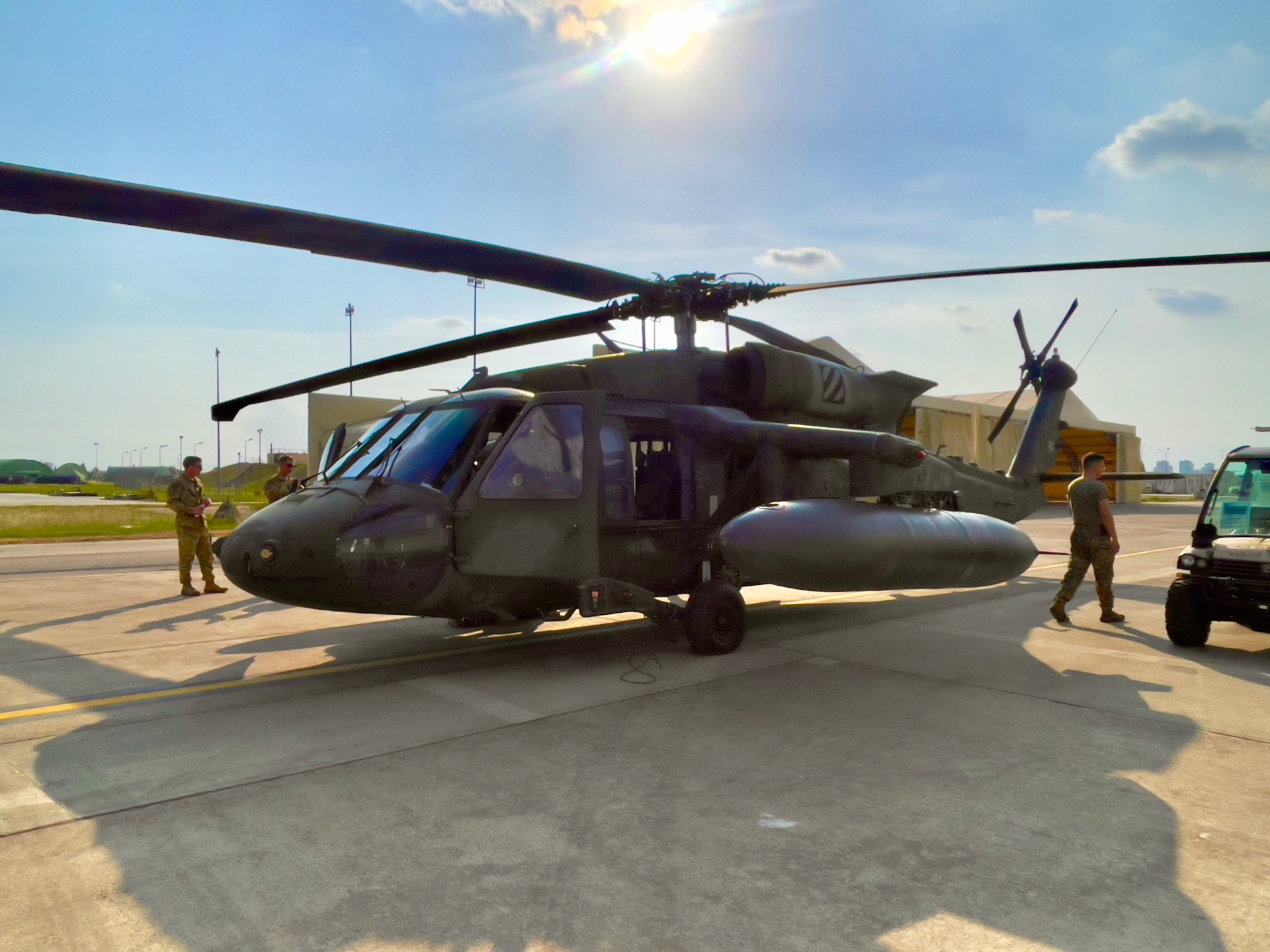 Military helicopter on a flightline
